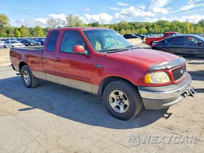 Czwarte zdjęcie samochodu z boku: 2002 FORD F150 VIN:1FTRX17202NA37863 - miniatura
