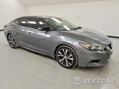 Czwarte zdjęcie samochodu z boku: 2017 NISSAN MAXIMA 3.5 SV VIN:1N4AA6AP9HC425197 - miniatura