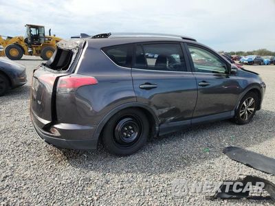Trzecie zdjęcie samochodu z tyłu: 2018 TOYOTA RAV4 XLE VIN:JTMWFREV4JJ184551 - miniatura
