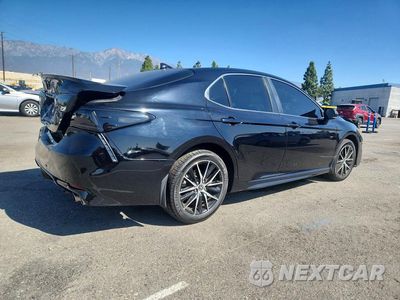 Trzecie zdjęcie samochodu z tyłu: 2024 TOYOTA CAMRY SE VIN:4T1G11AK2RU200705 - miniatura