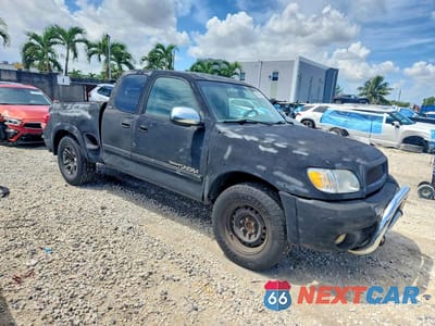 Czwarte zdjęcie samochodu z boku: 2004 TOYOTA TUNDRA SR5 VIN:5TBRT34114S443725 - miniatura