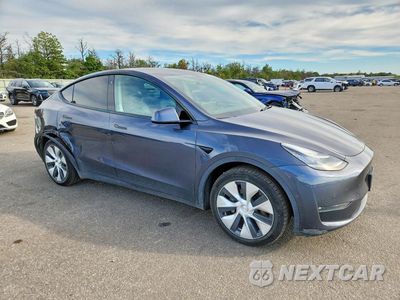 Czwarte zdjęcie samochodu z boku: 2021 TESLA MODEL Y VIN:5YJYGDEE9MF071067 - miniatura