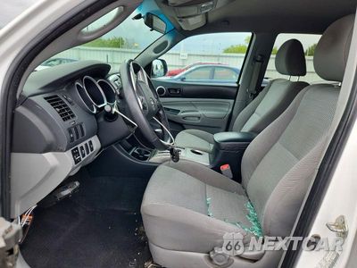 Zdjęcie 7 z 13 samochodu: 2014 TOYOTA TACOMA V6 VIN:3TMLU4EN8EM159950 - miniatura