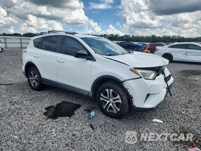 Czwarte zdjęcie samochodu z boku: 2016 TOYOTA RAV4 LE VIN:JTMZFREVXGJ064730 - miniatura