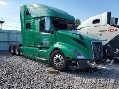 Czwarte zdjęcie samochodu z boku: 2021 VOLVO VNL SEMI TRUCK VIN:4V4NC9EH1MN274840 - miniatura