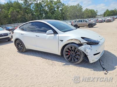 Czwarte zdjęcie samochodu z boku: 2022 TESLA MODEL Y VIN:7SAYGDEF7NF319474 - miniatura