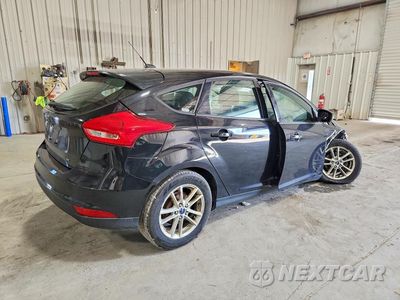 Trzecie zdjęcie samochodu z tyłu: 2017 FORD FOCUS SE VIN:1FADP3K29HL246462 - miniatura