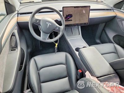 Zdjęcie 8 z 13 samochodu: 2023 TESLA MODEL Y VIN:7SAYGDEE4PA118154 - miniatura