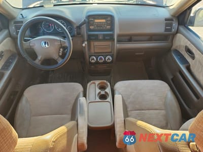 Zdjęcie 8 z 12 samochodu: 2003 HONDA CR-V LX VIN:JHLRD78493C016019 - miniatura