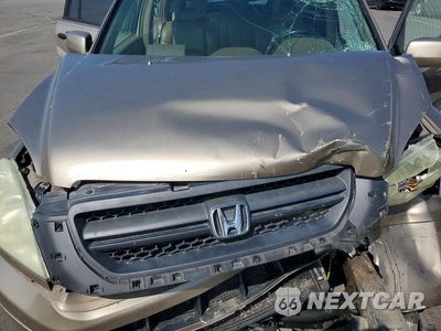 Zdjęcie 12 z 13 samochodu: 2005 HONDA PILOT EXL VIN:5FNYF18545B034300 - miniatura