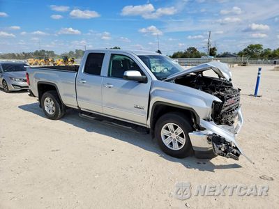 Czwarte zdjęcie samochodu z boku: 2017 GMC SIERRA C1500 SLE VIN:1GTR1MEC4HZ228959 - miniatura