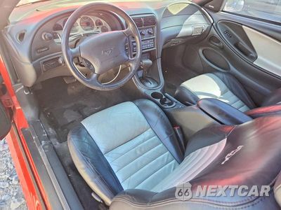 Zdjęcie 8 z 12 samochodu: 1999 FORD MUSTANG GT VIN:1FAFP45X2XF150028 - miniatura