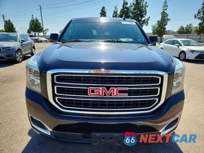 Piąte zdjęcie samochodu w środku: 2019 GMC YUKON SLT VIN:1GKS1DKCXKR405774 - miniatura