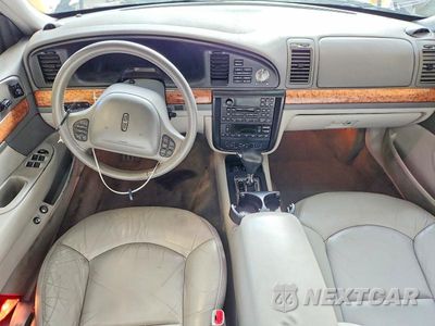 Zdjęcie 8 z 12 samochodu: 2000 LINCOLN CONTINENTAL VIN:1LNHM97V7YY853999 - miniatura