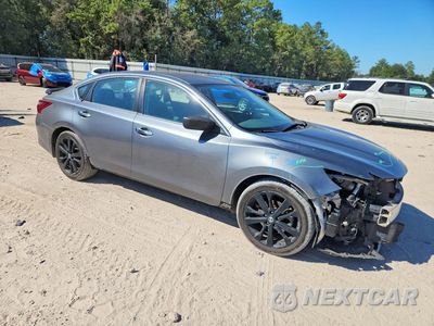 Czwarte zdjęcie samochodu z boku: 2017 NISSAN ALTIMA 2.5 SR VIN:1N4AL3AP9HC195573 - miniatura