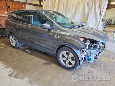 Czwarte zdjęcie samochodu z boku: 2016 FORD ESCAPE SE VIN:1FMCU9GX3GUA02476 - miniatura