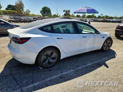 Trzecie zdjęcie samochodu z tyłu: 2023 TESLA MODEL 3 VIN:5YJ3E1EA7PF507642 - miniatura