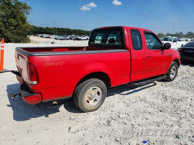 Trzecie zdjęcie samochodu z tyłu: 1999 FORD F150 VIN:1FTZX1725XNA93109 - miniatura