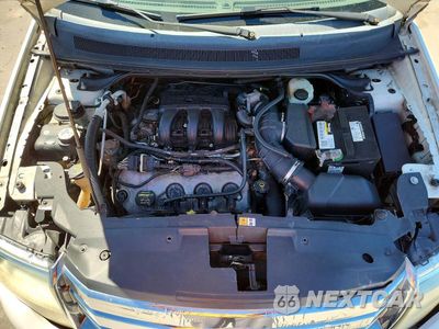 Zdjęcie 12 z 13 samochodu: 2009 FORD TAURUS X SEL VIN:1FMDK02W19GA01445 - miniatura