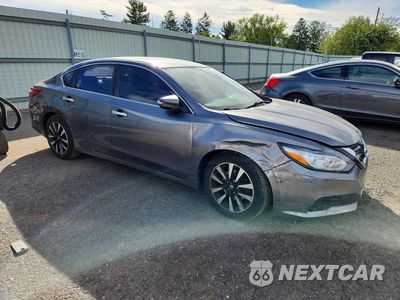 Czwarte zdjęcie samochodu z boku: 2018 NISSAN ALTIMA 2.5 SL VIN:1N4AL3AP1JC172584 - miniatura
