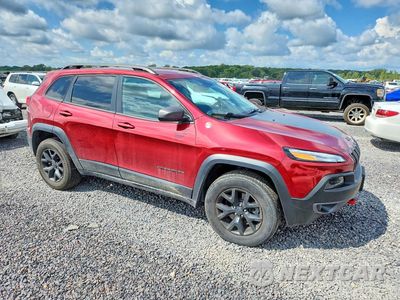 Czwarte zdjęcie samochodu z boku: 2016 JEEP CHEROKEE TRAILHAWK VIN:1C4PJMBS2GW269383 - miniatura