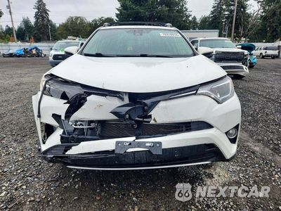 Piąte zdjęcie samochodu w środku: 2018 TOYOTA RAV4 HYBRID XLE VIN:JTMRJREV7JD212983 - miniatura