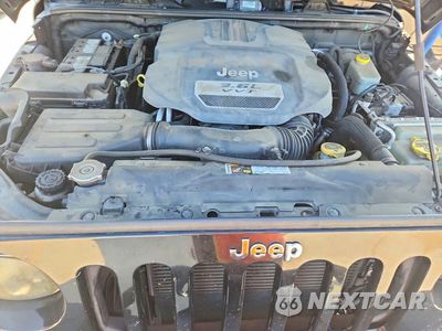 Zdjęcie 12 z 13 samochodu: 2012 JEEP WRANGLER UNLIMITED SPORT VIN:1C4BJWDG9CL281654 - miniatura
