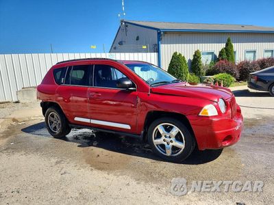 Czwarte zdjęcie samochodu z boku: 2010 JEEP COMPASS LIMITED VIN:1J4NT5FBXAD505258 - miniatura