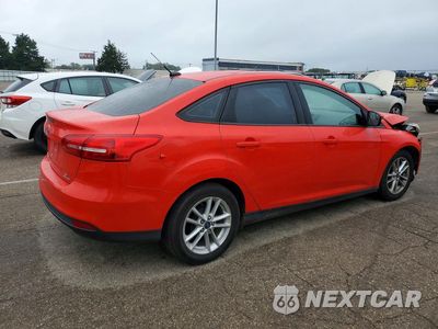 Trzecie zdjęcie samochodu z tyłu: 2016 FORD FOCUS SE VIN:1FADP3F27GL336136 - miniatura
