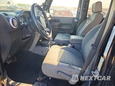 Zdjęcie 7 z 12 samochodu: 2009 JEEP WRANGLER UNLIMITED SAHARA VIN:1J4GA59149L760569 - miniatura