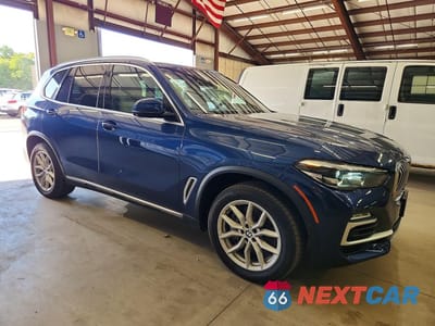 Czwarte zdjęcie samochodu z boku: 2021 BMW X5 XDRIVE45E VIN:5UXTA6C08M9F27585 - miniatura