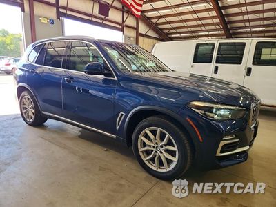 Czwarte zdjęcie samochodu z boku: 2021 BMW X5 XDRIVE45E VIN:5UXTA6C08M9F27585 - miniatura