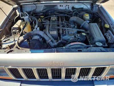 Zdjęcie 12 z 14 samochodu: 2000 JEEP CHEROKEE SPORT VIN:1J4FF48S4YL211101 - miniatura