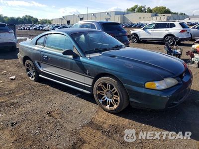 Czwarte zdjęcie samochodu z boku: 1994 FORD MUSTANG VIN:1FALP4042RF130221 - miniatura