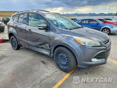 Czwarte zdjęcie samochodu z boku: 2014 FORD ESCAPE TITANIUM VIN:1FMCU9J98EUC76103 - miniatura