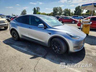 Czwarte zdjęcie samochodu z boku: 2024 TESLA MODEL Y VIN:7SAYGDEE8RA293980 - miniatura
