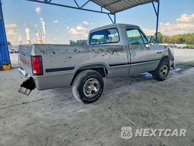 Trzecie zdjęcie samochodu z tyłu: 1993 DODGE D-SERIES D150 VIN:1B7GE16X3PS248798 - miniatura