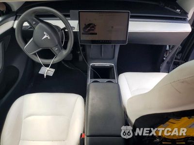 Zdjęcie 8 z 14 samochodu: 2022 TESLA MODEL Y VIN:7SAYGAEE9NF539284 - miniatura