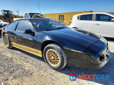 Czwarte zdjęcie samochodu z boku: 1988 PONTIAC FIERO GT VIN:1G2PG119XJP200412 - miniatura