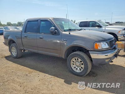 Czwarte zdjęcie samochodu z boku: 2002 FORD F150 SUPERCREW VIN:1FTRW08L72KB31356 - miniatura