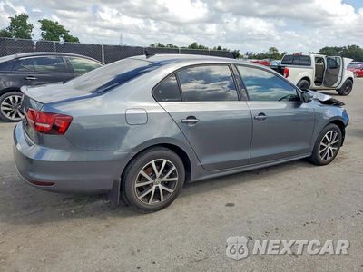 Trzecie zdjęcie samochodu z tyłu: 2017 VOLKSWAGEN JETTA SE VIN:3VWDB7AJ3HM389766 - miniatura
