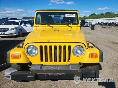 Piąte zdjęcie samochodu w środku: 2004 JEEP WRANGLER X VIN:1J4FA39S44P764907 - miniatura