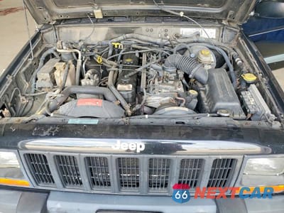 Zdjęcie 12 z 13 samochodu: 1998 JEEP CHEROKEE SPORT VIN:1J4FJ68S1WL252714 - miniatura