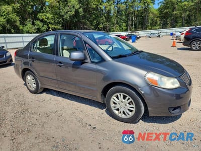 Czwarte zdjęcie samochodu z boku: 2012 SUZUKI SX4 LE VIN:JS2YC5A32C6300677 - miniatura