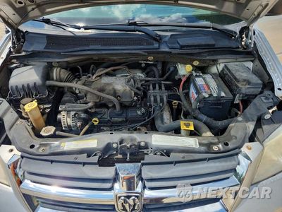 Zdjęcie 12 z 13 samochodu: 2010 DODGE GRAND CARAVAN SE VIN:2D4RN4DE3AR384226 - miniatura