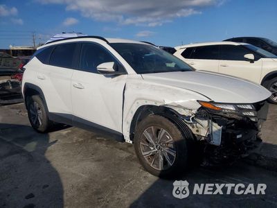 Czwarte zdjęcie samochodu z boku: 2022 HYUNDAI TUCSON BLUE VIN:KM8JBCA17NU078584 - miniatura