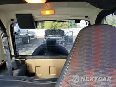 Zdjęcie 10 z 13 samochodu: 2000 JEEP WRANGLER / TJ SPORT VIN:1J4FA49S1YP713263 - miniatura