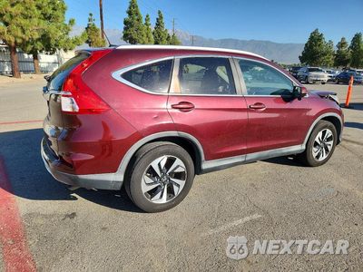 Trzecie zdjęcie samochodu z tyłu: 2016 HONDA CR-V TOURING VIN:5J6RM3H90GL013642 - miniatura