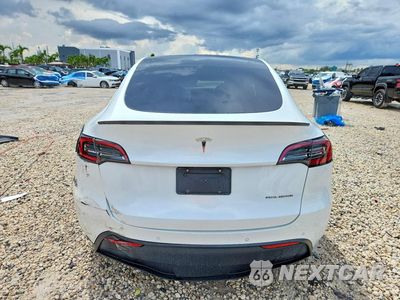 Zdjęcie 6 z 13 samochodu: 2022 TESLA MODEL Y VIN:7SAYGDEE5NF356840 - miniatura