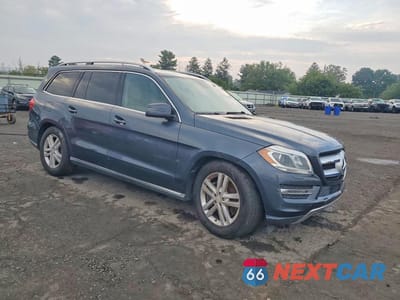 Czwarte zdjęcie samochodu z boku: 2013 MERCEDES-BENZ GL 450 4MATIC VIN:4JGDF7CE5DA208824 - miniatura